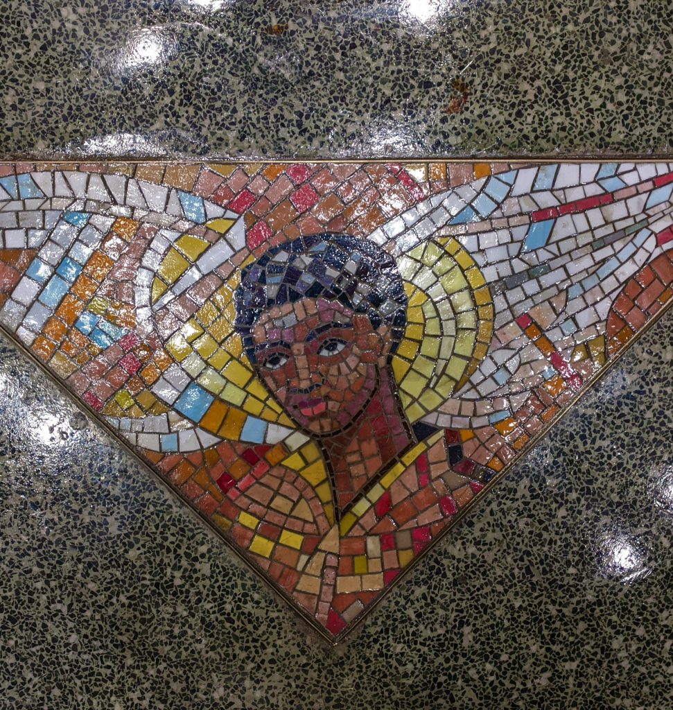 A mosaic picture of an angel in the form of an African American person