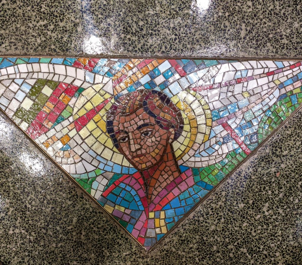 A mosaic picture of an angel in the form of a Port Rician person