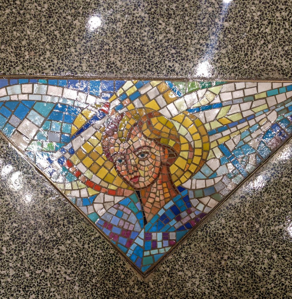 A mosaic picture of an angel in the form of a Caucasian person