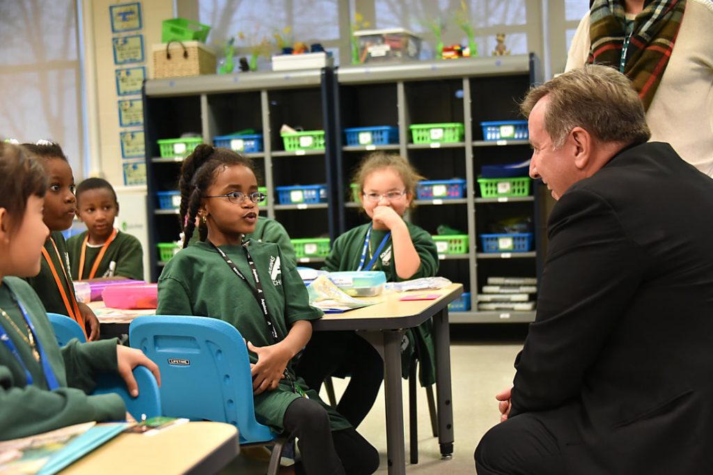 Bishop McClory meeting with school children.