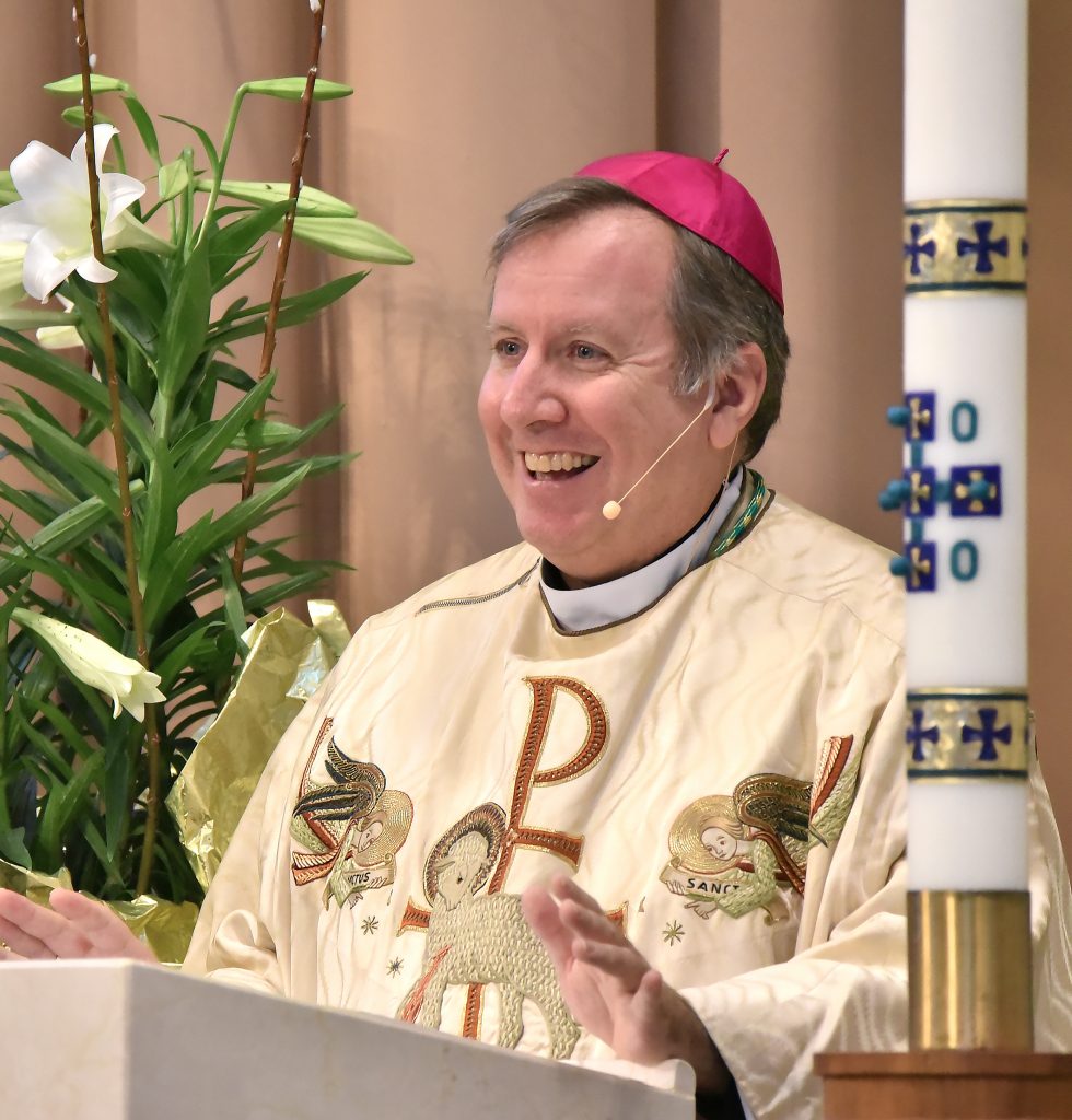 Bishop McClory of the Diocese of Gary smiling while delivering the homily on Easter at the Cathedral of the Holy Angels